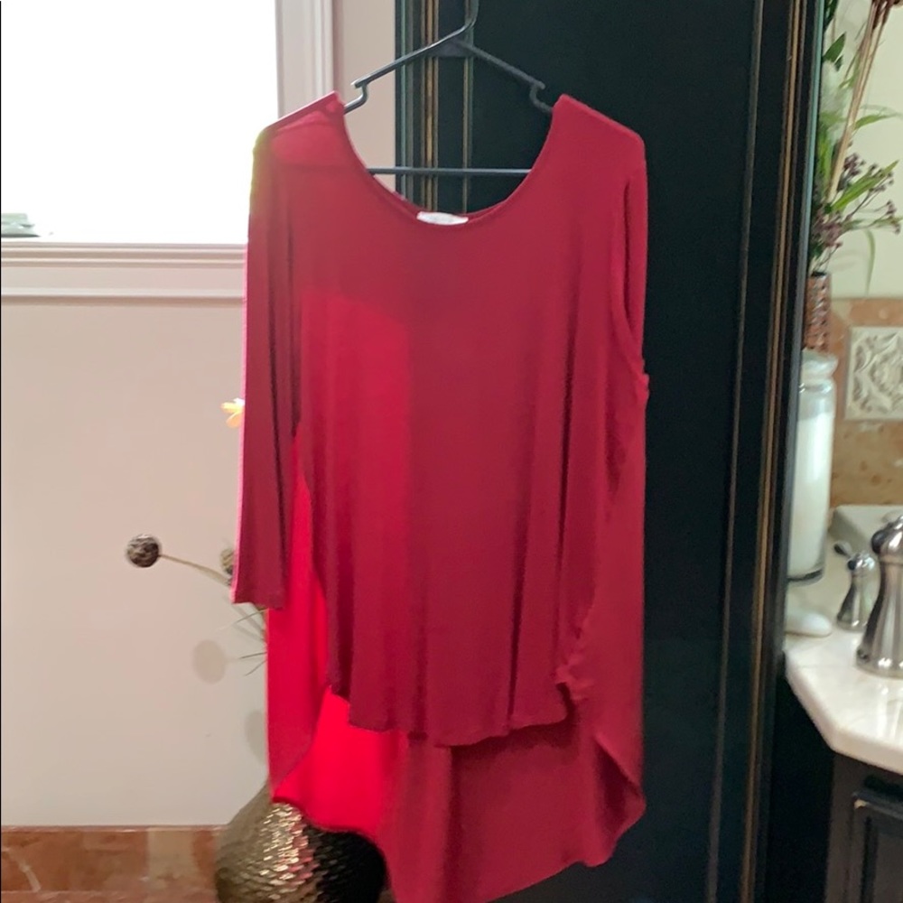 Long dressy blouse red in color